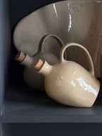 Tipped Oil Bottles
